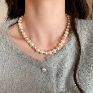 Elegant multi-color pearl necklace with white pink and champagne pearls on model