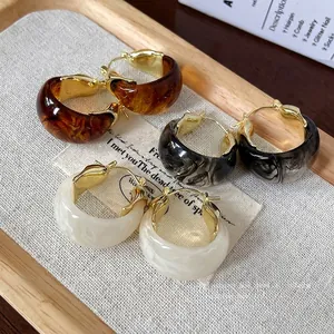 Vintage marbled resin U-shaped hoop earrings with gold-toned metal accents in three colors