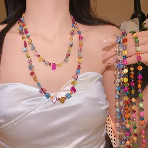 Detail of Bohemian multi-layer colorful irregular crystal bead necklace on model neck