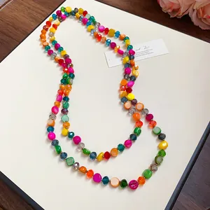 Detailed view of bohemian multi-layer necklace with irregular colorful crystal beads