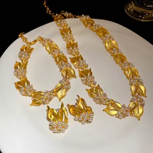 Vintage Goldschmuck-Set mit Perlen- und Zirkon-Weizenähren-Halskette und Armband.