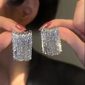 Elegant silver leaf tassel drop earrings featuring a sparkling fringe design for women