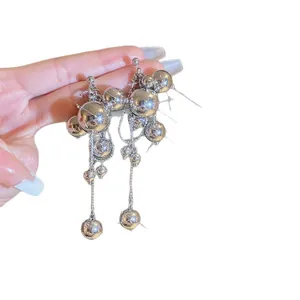 Elegant silver ball tassel drop earrings with a sparkling minimalist luxury design