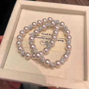 Elegant French style pearl bracelet with rhinestone paved beads in jewelry box