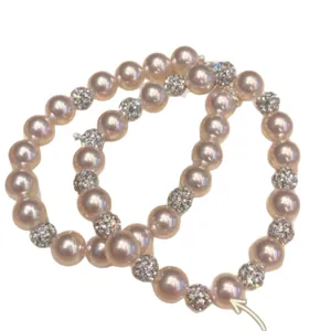 Elegant French-style rose pearl bracelet with shimmering rhinestone-studded beads