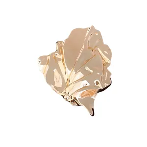Irregular gold leaf metallic brooch with textured wrinkled design for women
