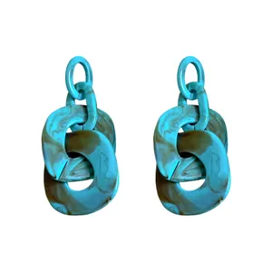 Statement acrylic geometric chain earrings with blue marble pattern and steel pins