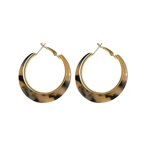 Elegant retro brown leopard print resin hoop earrings with stylish golden metal accents