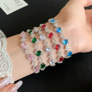 Close-up detail of colorful irregular zircon oval bracelets with silver settings