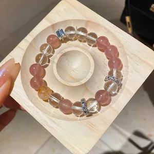 Natural yellow crystal and strawberry quartz beaded bracelet with silver spacers