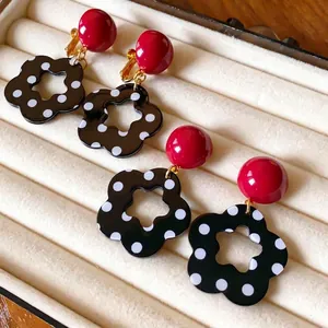 Retro red spherical studs with black and white polka dot hollow flower earrings set
