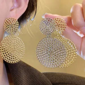 Elegant hollow mesh circular drop earrings in radiant gold and silver finish for women