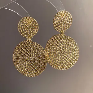 Elegant gold hollow circular dangle earrings with exquisite woven texture design for women