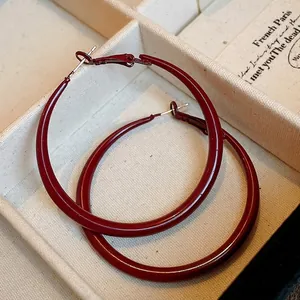 Elegant dark red enamel hoop earrings in vintage style for women