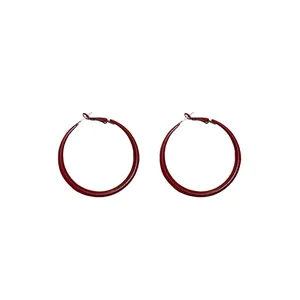 Large red enamel hoop earrings with silver pins for a classic retro vintage look