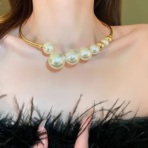 Close-up detail of a French Baroque style choker necklace featuring lustrous white pearls.