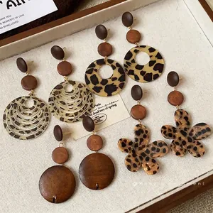 Vintage Maillard style wooden earrings with leopard print and flower flower designs.