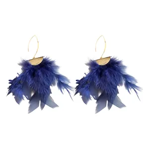 Chic navy blue feather tassel earrings with gold textured semi-circle accent