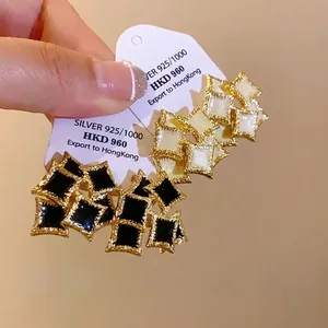 Elegant gold-trimmed enamel double-layer square stud earrings in black and white finish