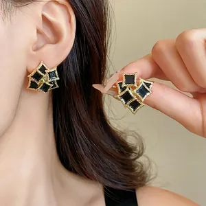 Elegant minimalist black geometric double-layer square stud earrings with gold trim design