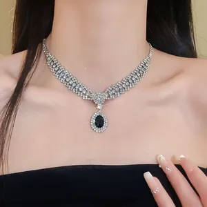 Elegant bridal necklace with sparkling crystals and a central oval black pendant detail