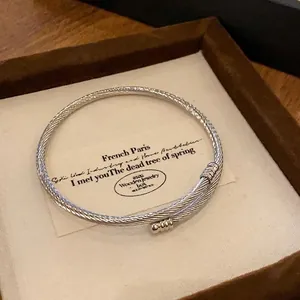 Minimalist silver twisted cable open bangle bracelet with high-end niche design