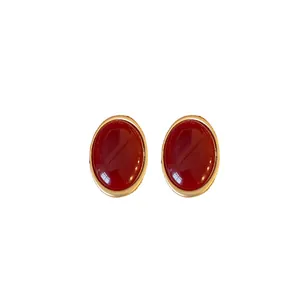 Vintage court style oval stud earrings in elegant Ankara red and gold finish for women