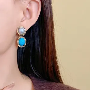 Elegant vintage French style gold earrings with artificial pearl and oval turquoise stone