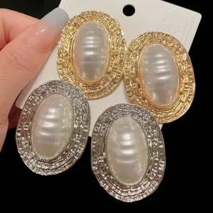 Eleganti orecchini ovali con perle stile vintage francese e texture a righe oro e argento