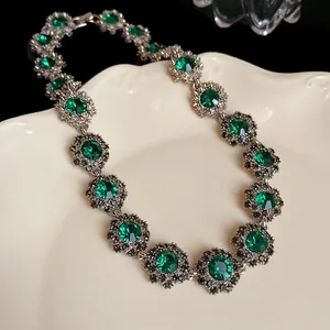Vintage emerald green crystal floral necklace with silver-tone finish for women