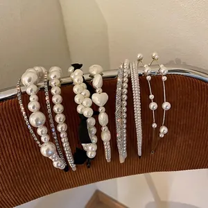 Elegant French vintage white pearl headbands collection with black bows for sweet women hair styling