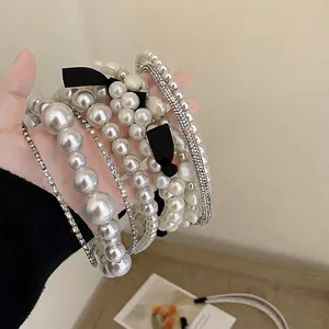 Elegant French vintage pearl headband collection with rhinestones and black bows for women