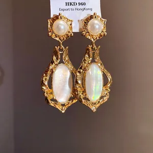 Elegant vintage gold drop earrings with oval shell inlay and round pearl detail