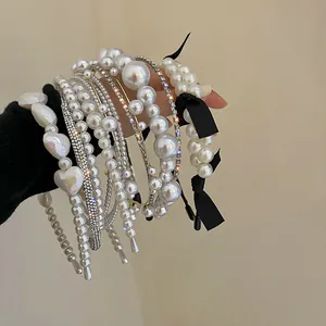 Elegant French vintage collection of white pearl and rhinestone headbands for stylish women