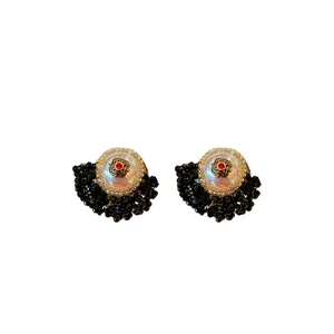 Elegant French vintage pearl and black crystal flower stud earrings for chic women