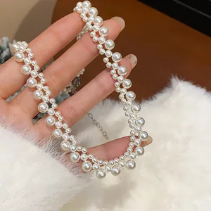 Macro detail of French retro double-layer white pearl necklace with elegant luster