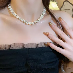 Elegant French retro style multi-layered pearl choker necklace worn by model close-up