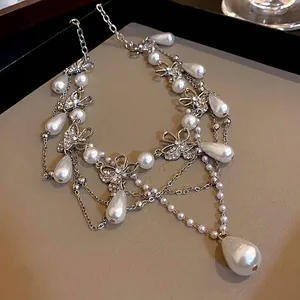 Exquisite French style butterfly pendant necklace with layered faux pearls and rhinestones