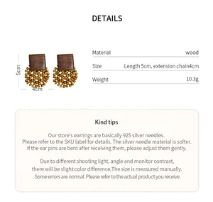 Detailed specifications and care information for these vintage wood geometric drop earrings.