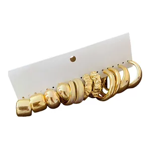 Set of 6 pairs vintage gold irregular pleated and chunky hoop earrings on display card