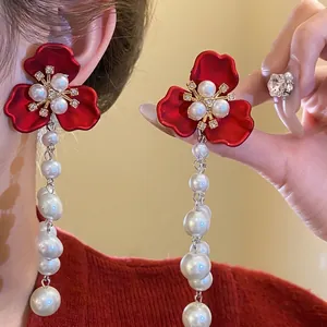 Vintage court style red flower earrings with rhinestone centers and long pearl tassels