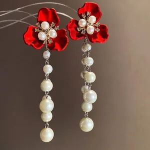 Retro red floral drop earrings with white pearl dangles and elegant crystal accents