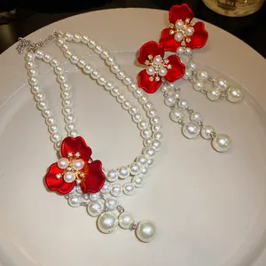 Elegant vintage palace style pearl flower jewelry set with necklace and long earrings