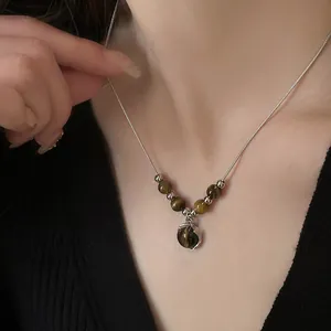 Vintage tiger eye stone pendant necklace with sleek silver chain for luxury style