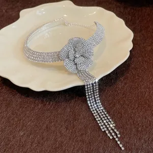 Elegant silver-toned rhinestone flower choker necklace with sparkling long crystal tassels