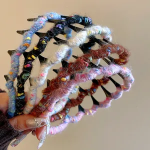 Close-up of winter wool wrapped wavy headbands in various colors for high volume style