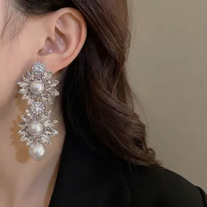 Vintage oversized double flower dangle earrings with shiny rhinestones and elegant pearls