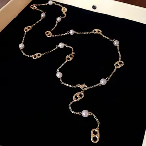 Elegant gold-plated coffee bean link necklace with white pearls for a luxury look