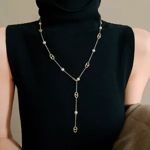Detail of French style gold-plated pig nose pearl long sweater chain necklace