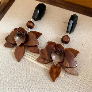 Retro Maillard-style resin flower drop earrings with black faceted studs for women